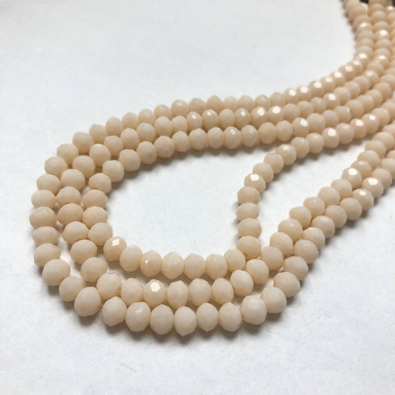 חרוזי קריסטל צ'כיה על חוט בצבע אפרסק מט, רונדל מחורץ, קוטר 6×4,5 מ״מ, אורך 38-40 ס״מ