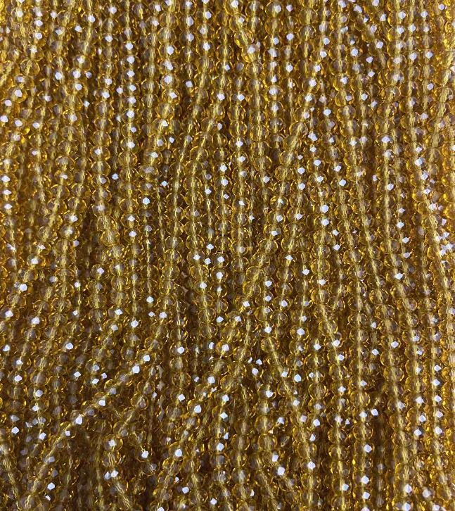 חרוזי קריסטל צ'כי על חוט דיג בצבע ענבר שקוף, בצורת רונדל, קוטר 3,5×3 מ״מ + -, אורך 33 ס״מ +