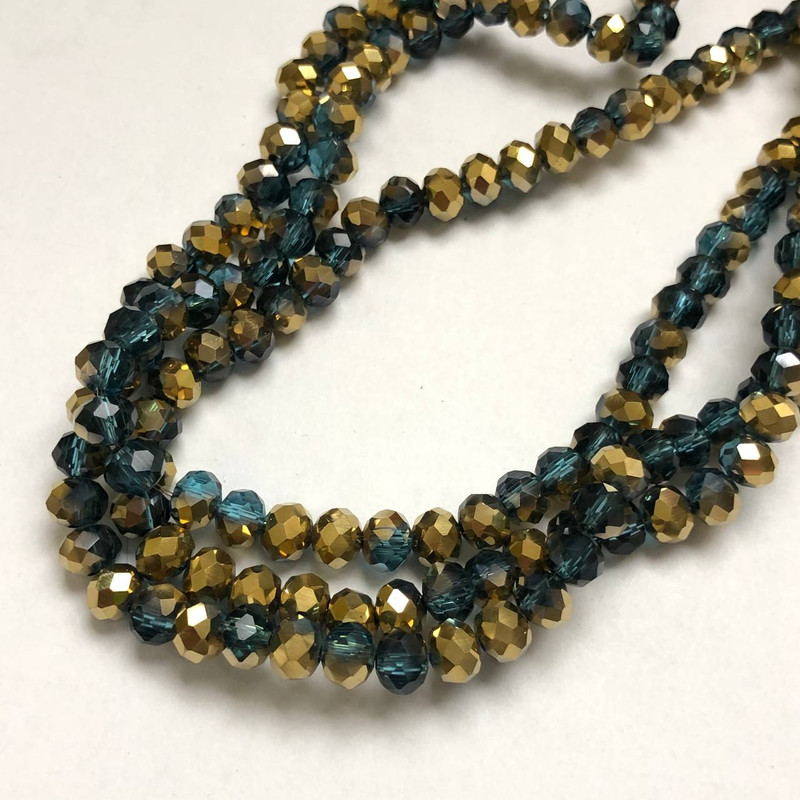 חרוזי קריסטל צ'כי על חוט – מגוון ירוק אמרלד שקוף עם ציפוי מחורץ, קוטר 6×4.5 מ״מ, אורך 38–40 ס״מ