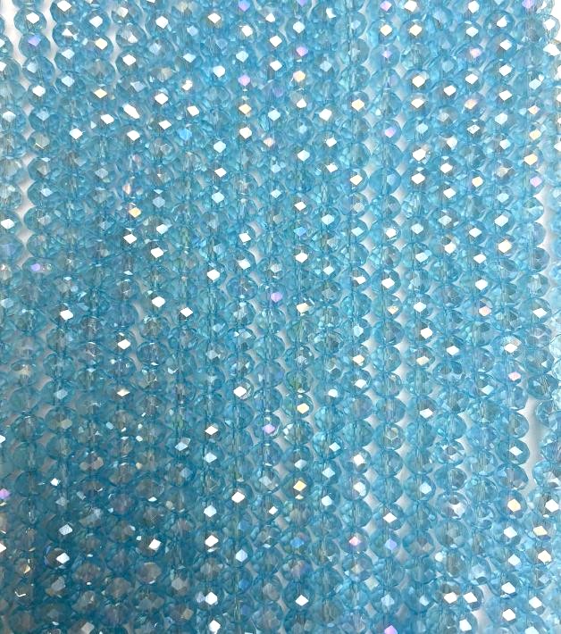 חרוזי קריסטל צ'כי על חוט כחולים שקופים עם ציפוי בגוון בנזין, צורה גרנובנית רונדל, קוטר 6×5 מ״מ + -, אורך 40–42 ס״מ +