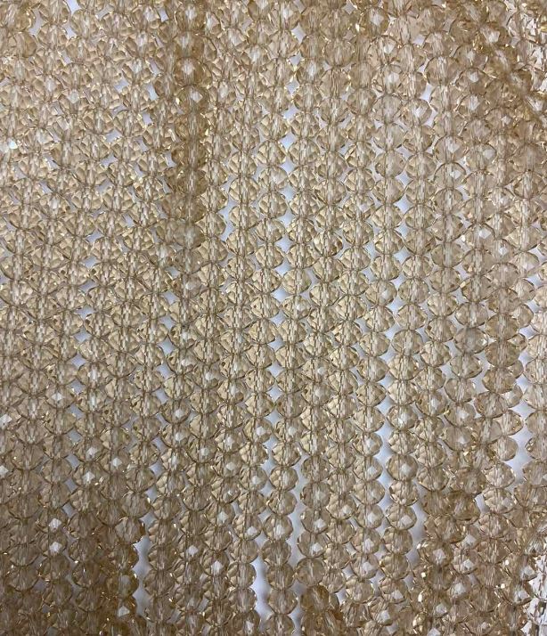 חרוזים מקריסטל צ'כי בגוון ענבר שקוף על חוט, רונדל מחורץ בקוטר 6×5 מ״מ + -, אורך 40 ס״מ +