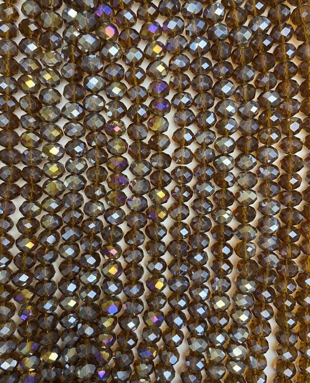 חרוזי קריסטל צ'כי על חוט בצבע חום שקוף עם ציפוי בנזין, רונדל גרנואני, קוטר 8×6 מ״מ + -, אורך 38 ס״מ +