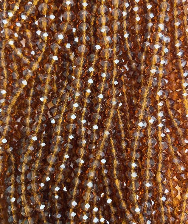 חרוזי קריסטל צ'כי על חוט דק, חומים שקופים חרוטים, קוטר 6×5 מ״מ + -, אורך 40–42 ס״מ +