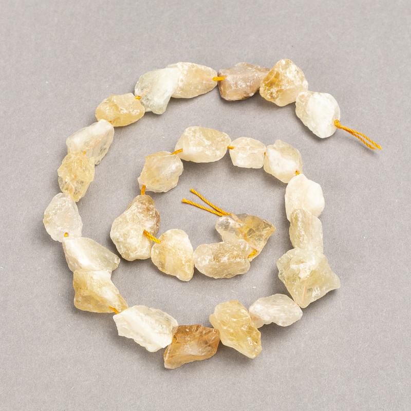 חרוזי ציטרין מגולפים על חוט, אבן טבעית, קוטר 16×12(±) מ״מ, אורך 41 ס״מ