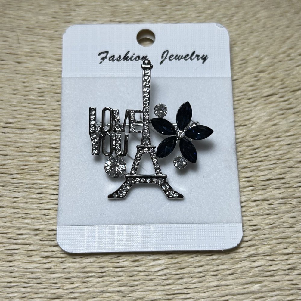 סיכת פריז מתכת כסופה עם זרקונים וקריסטלים כחולים 40×35 מ״מ +