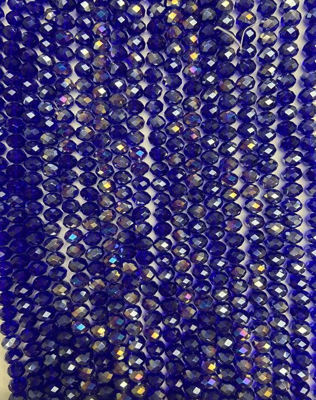 חרוזי קריסטל צ'כי על חוט, בצבע כחול עם גוון «בנזין» «רונדל מחוספס», קוטר 8×6 מ״מ, אורך 40–42 ס״מ+