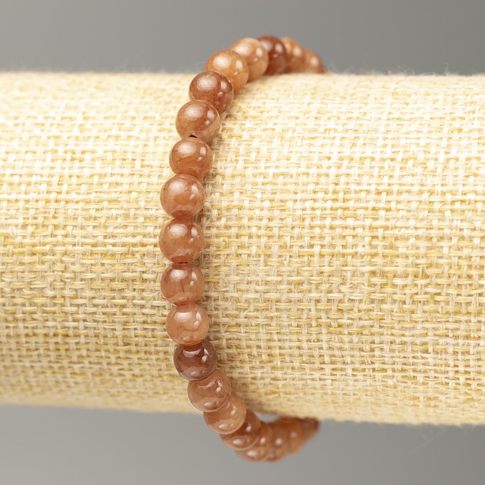 צמיד אלסטי עם סלניט מדומה (אקריל מלאכותי) כדור חלק, קוטר 6.5 מ״מ, אורך 18 ס״מ+