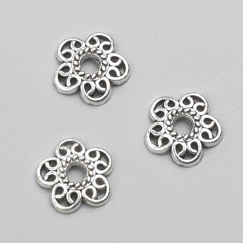 אביזר קצה בצבע כסף למתכת, קוטר 12×2 מ״מ (±), אריזה -20 גרם, 52(±) יחידות