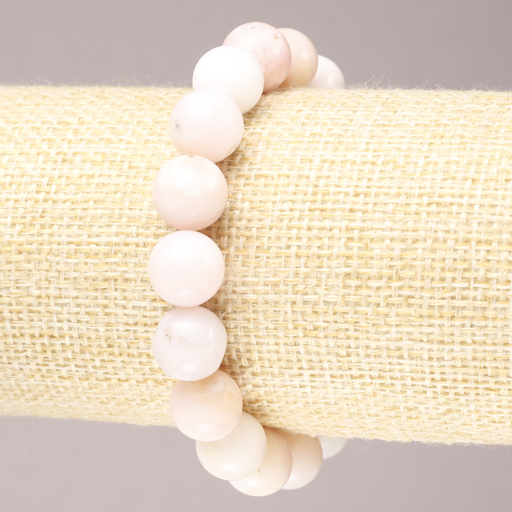 צמיד גומי מאבן טבעית — אופל ורוד, חרוזים חלקים בקוטר 10 מ״מ