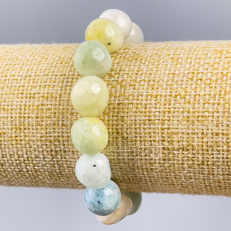 צמיד מורגנייט טבעי – אבן חתוכה בחתכים שונים בגודל d 10×12-13×18 מ״מ, אורך 18 ס״מ (אלסטי)