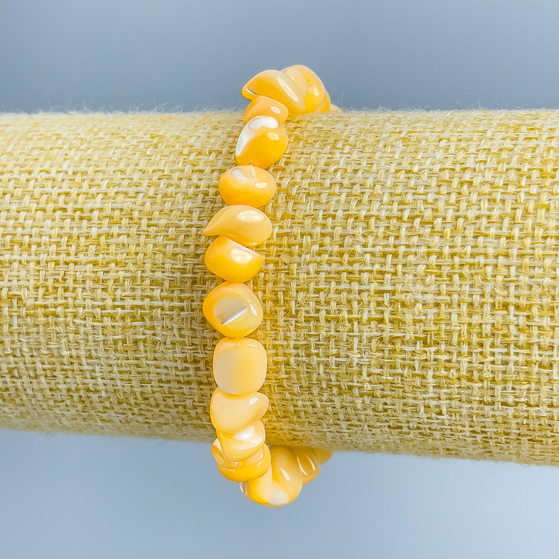 צמיד פרלאמוטר כתום בהיר מלוטש, קוטר 8×6 מ״מ, אורך 18 ס״מ (אלסטי)