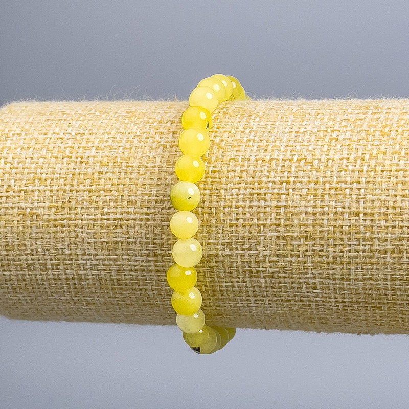 צמיד קוורץ צבוע וולוסאטיק – חרוז חלק בקוטר 6.5 מ״מ, אורך 18 ס״מ (סטרץ)