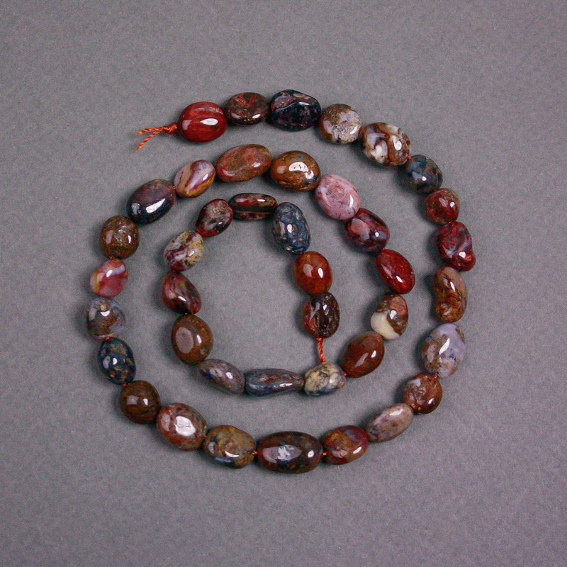 מחרוזים על חוט פטרסיט אבן טבעית מגולטת, קוטר 7×10 מ״מ+-, אורך 38 ס״מ+-