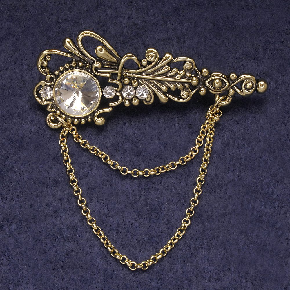 סיכת תכשיט «אקצנט» עם זרקונים לבנים וקריסטל מרכזי, מתכת בגוון זהוב 55×22 מ״מ